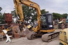 mini escavatore Caterpillar