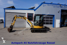 mini escavatore Caterpillar