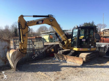 mini escavatore Caterpillar