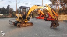 mini escavatore Caterpillar