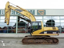escavatore intermediario strada/rotaia Caterpillar