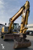 escavatore gommato New Holland