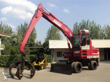 escavatore gommato usato