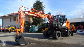 escavatore gommato usato