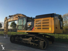 escavatore intermediario strada/rotaia Caterpillar