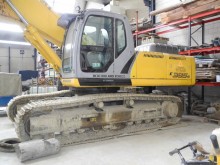 escavatore cingolato New Holland