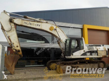 escavatore intermediario strada/rotaia Caterpillar