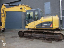 escavatore intermediario strada/rotaia Caterpillar