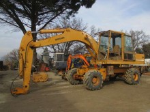 escavatore gommato Dresser
