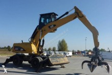escavatore per movimentazione Caterpillar
