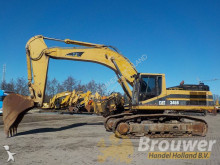 escavatore intermediario strada/rotaia Caterpillar