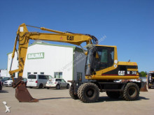 escavatore gommato Caterpillar