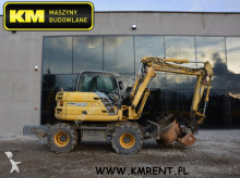 pelle sur pneus New Holland