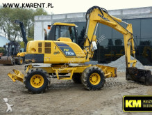 graafmachine op banden Komatsu