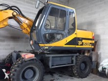 escavatore gommato usato