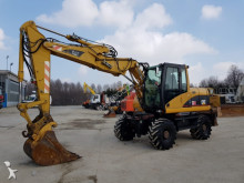 escavatore gommato usato