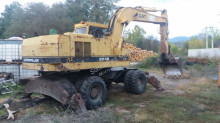 graafmachine op banden Caterpillar