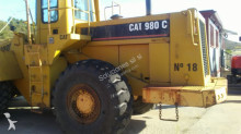escavatore gommato Caterpillar