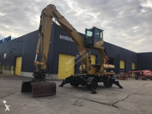 экскаватор для жележнодорожных дорог Caterpillar