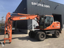 экскаватор колёсный Doosan