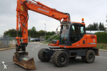 graafmachine op banden Doosan