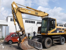 escavatore gommato Caterpillar