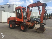 escavatore gommato Mecalac