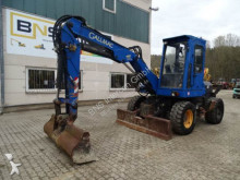 escavatore gommato Gallmac