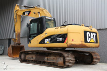 escavatore intermediario strada/rotaia Caterpillar