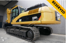 escavatore intermediario strada/rotaia Caterpillar