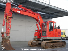 escavatore intermediario strada/rotaia Case