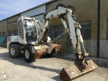 escavatore gommato Mecalac