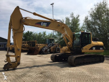 escavatore intermediario strada/rotaia Caterpillar