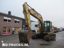 escavatore intermediario strada/rotaia Caterpillar