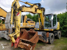 escavatore gommato New Holland