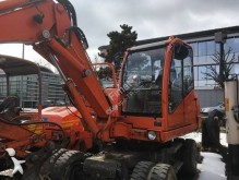escavatore gommato Neuson