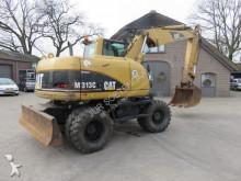 mini escavatore Caterpillar