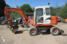 escavatore gommato Schaeff