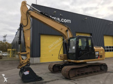 escavatore intermediario strada/rotaia Caterpillar