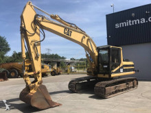 escavatore intermediario strada/rotaia Caterpillar