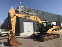 escavatore intermediario strada/rotaia Caterpillar