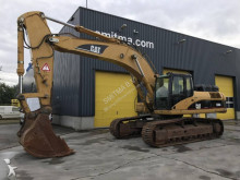 escavatore intermediario strada/rotaia Caterpillar