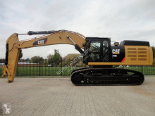 escavatore intermediario strada/rotaia Caterpillar