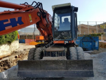 graafmachine op banden Fiat