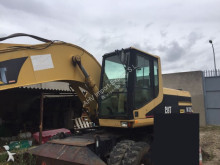Caterpillar 320 - RETRO EXCAVADORA RUEDAS M 2000