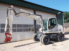 graafmachine op banden Atlas