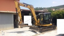 mini escavatore Caterpillar