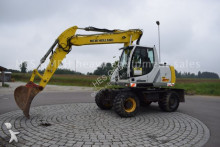 pelle sur pneus New Holland