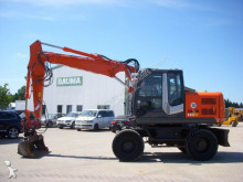 graafmachine op banden Hitachi