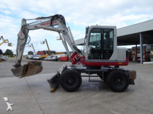 graafmachine op banden Takeuchi